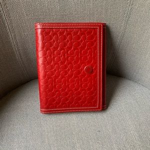 Classic red COACH leatherware photo album